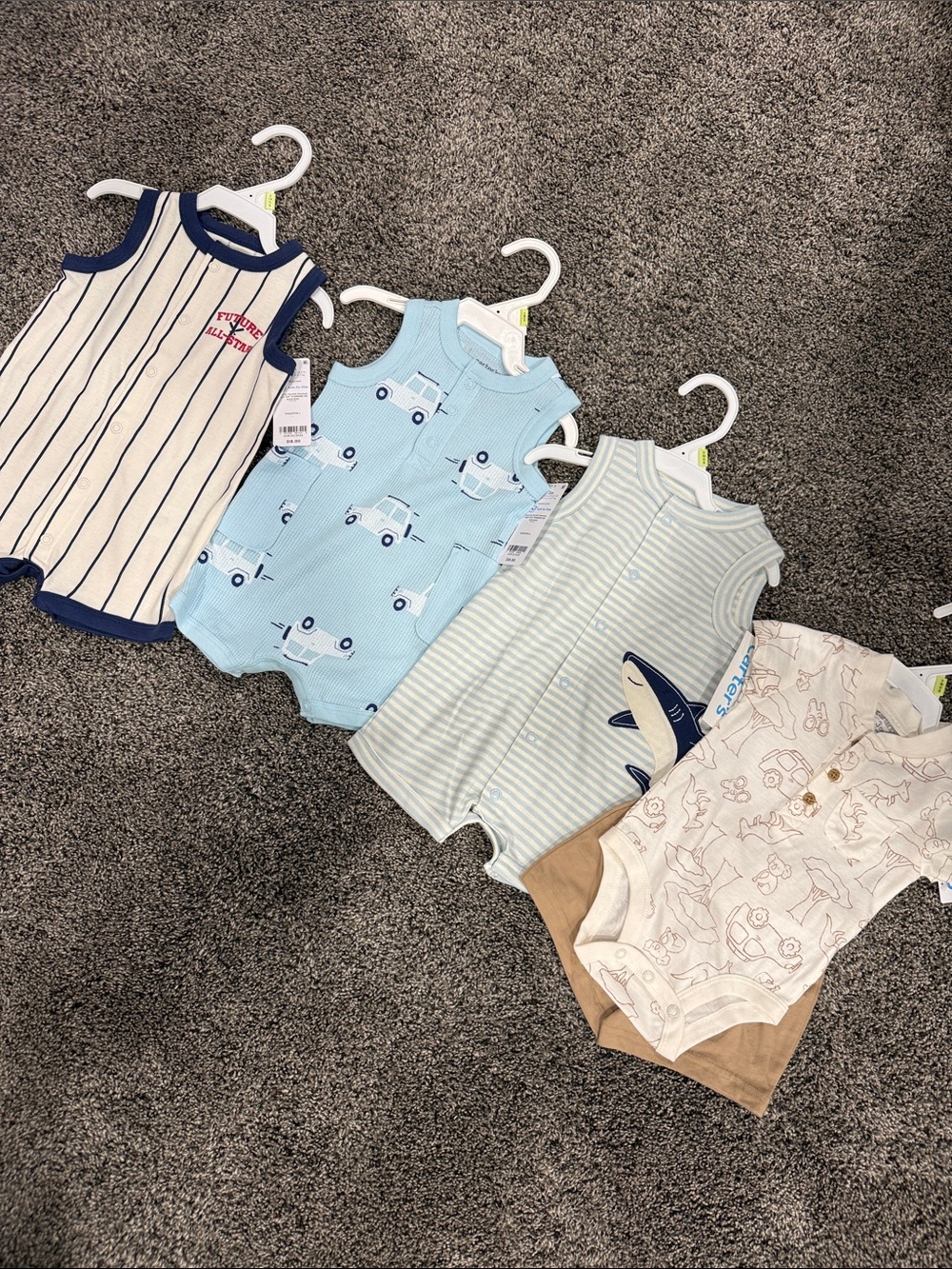 Set of 4 Carter's outfits. NWT. Size 3 months